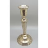 A silver candlestick, Birmingham 1977, 17.5cm, (stem slightly out of shape)