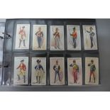 Cigarette cards;-an album of military related cards with eleven complete sets including Player’s