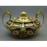 A Royal Crown Derby 2451 pattern two handled pot with lid, 13.5cm wide with handles