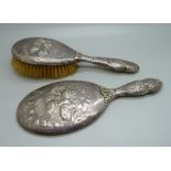 Two silver backed brushes decorated with Reynolds angels, a/f