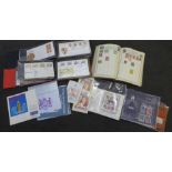 Two folders of first day covers, a stamp album and other stamps