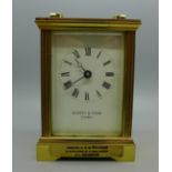 A Mappin & Webb carriage clock, with presentation plaque