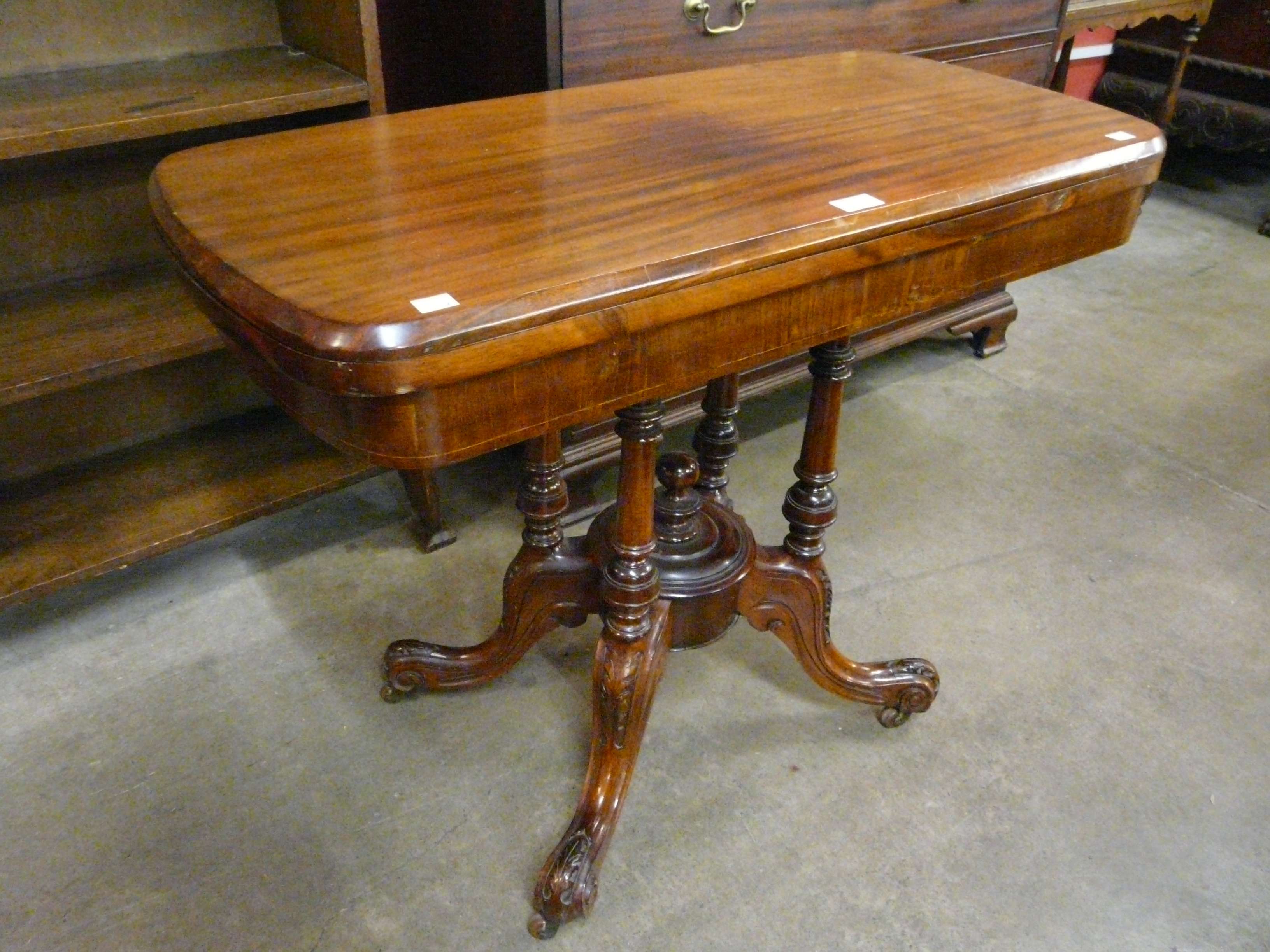 A Victorian mahogany fold over games table - Image 2 of 3