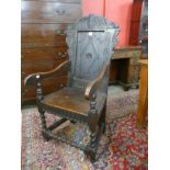 A 17th Century style carved oak Wainscot chair