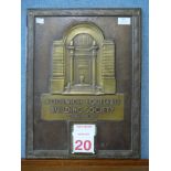 A Woolwich Equitable Building Society brass and copper calendar plaque