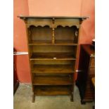 An Arts and Crafts oak open bookcase