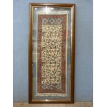 A framed Iranian wall hanging