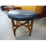 A G-Plan Fresco teak and and black vinyl stool