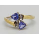 A silver gilt trilliant cut tanzanite ring, Q