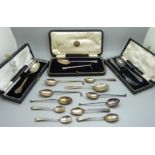Two silver Christening sets and a silver spoon, cased, and eleven other silver spoons, 249g