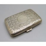 A silver cigarette case, Birmingham 1899, 65g