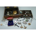 A jewellery box with a Victorian silver brooch, silver rings, a pair of 925 silver scarab cufflinks,