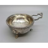 A silver tea strainer on stand, Birmingham 1937, 88g