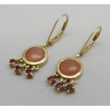 A pair of silver gilt pink moonstone and garnet earrings