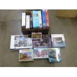 A collection of jigsaw puzzles including Downton Abbey, National Gallery and other art