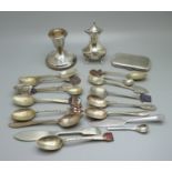 A silver candlestick with inscription, a silver pepperette, plated spoons and a cigarette case, (