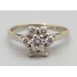 An 18ct gold diamond cluster ring, 2.8g, N