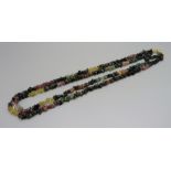 A double strand semi-precious stone necklace with an 18ct gold clasp