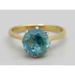 An 18ct gold and platinum set, blue/green zircon solitaire ring, 2.6g, J