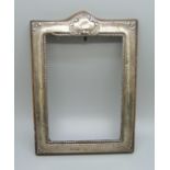 A silver photograph frame, a/f, height 18cm