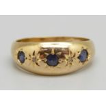 An 18ct gold, diamond and sapphire ring, Birmingham 1909, 2.2g, M