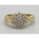 A 9ct gold diamond cluster ring, 2.6g, J