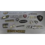 A collection of car badges