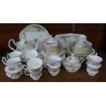 A Royal Albert 'Moss Rose' tea service, six setting with additional bowls, cream and sugar, and a