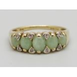 A 9ct gold, jade and eight stone diamond ring, 2.6g, Q