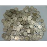 A collection of one shilling coins including 542g of 1920 to 1946