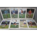 A collection of twenty-four large Ty-Phoo Tea footballer cards, including George Best, Bobby