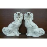 A pair of Staffordshire Spaniels, 30cm