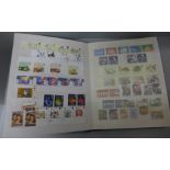 Stamps;-stock book of GB decimal mint, mainly in sets and with a face value of over £160