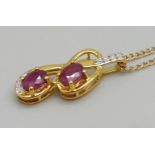 A 9ct gold Thai ruby and diamond pendant, 1.6g, with certificate, and a plated chain