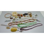 Costume jewellery, including a Bakelite brooch and glass beads