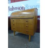 A Swedish SMI teak cylinder bureau, designed by Egon Ostergaard