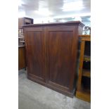 A George IV mahogany two door enclosed bookcase