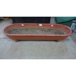 A cast iron feeding trough