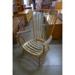 An Ercol Blonde beech Windsor armchair