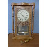 A 19th Century American inlaid walnut wall clock