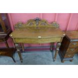 A Victorian oak armorial serving table, carved with Prince of Wales crest