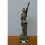 A bronze figure of a Chinese lady in military uniform, on green marble socle