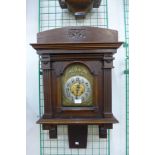 A late 19th Century French carved oak wall clock