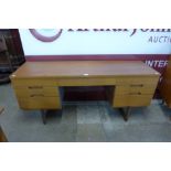 A Uniflex teak desk