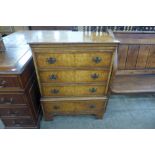 A George I style figured walnut chest of drawers