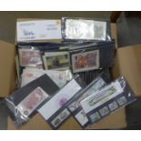 A box of stamps, first day covers and stamps in albums