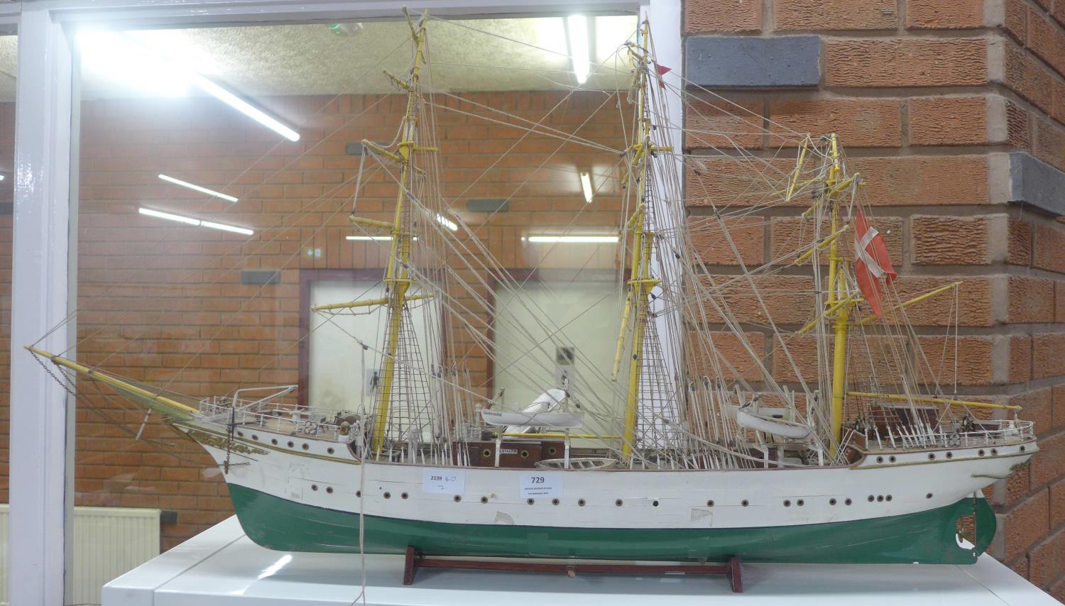 A model of a tall masted ship, 85cm long **PLEASE NOTE THIS LOT IS NOT ELIGIBLE FOR POSTING AND