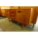 A small teak sideboard