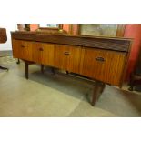 An Elliotts of Newbury afromosia concave sideboard