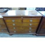 A George III inlaid mahogany chest of drawers